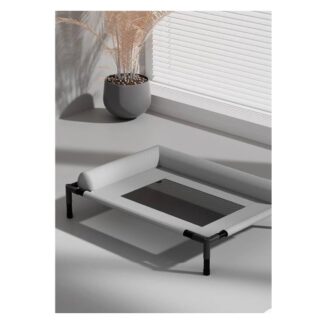 Elevated cooling dog bed with breathable mesh center and low raised frame