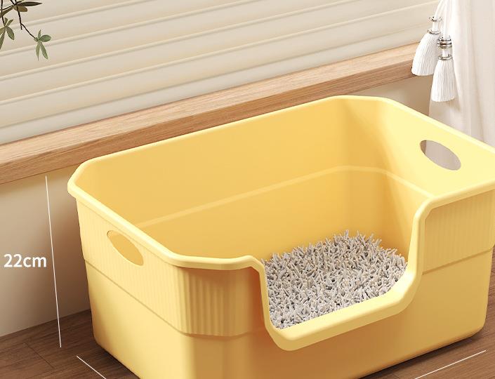 Open low-front cat litter box in yellow