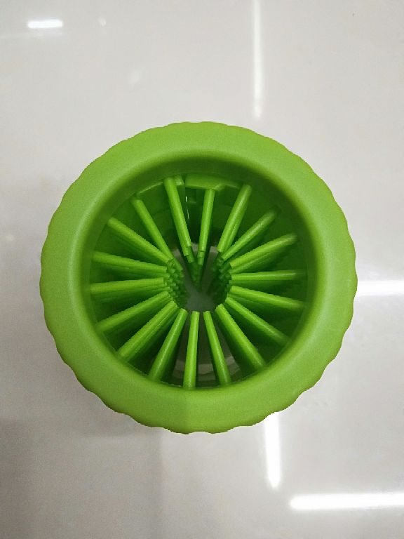 Soft silicone bristles inside dog paw cleaner cup